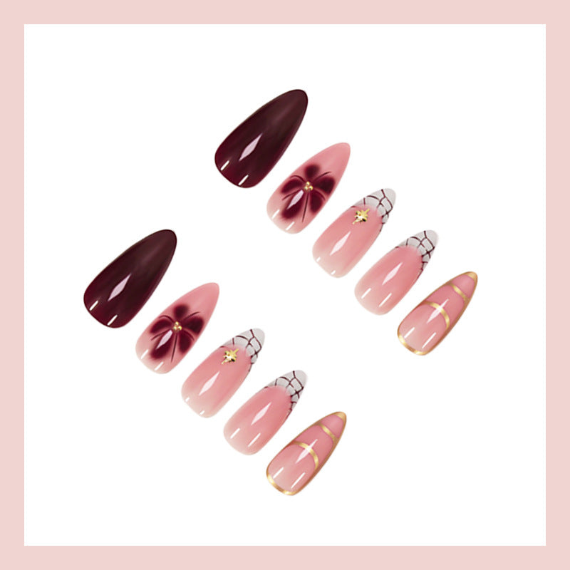 Artificial nail set with elegant floral and glamorous design elements Stornfield