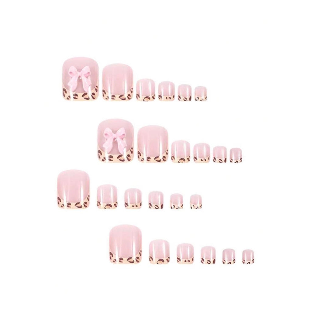 Nail art set with vibrant bow design and trendy leopard pattern Stornfield