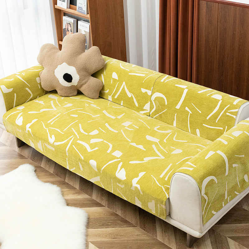 Removable sofa cover with abstract graphic print and elastic fitting edge