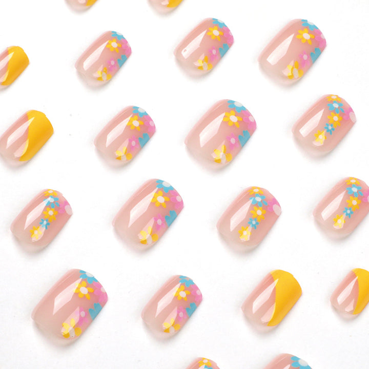 Artful Nail Extensions with Floral Pattern Stornfield