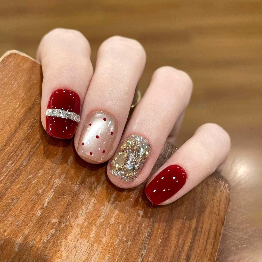 Glamorous artificial nails with sparkling rhinestones Stornfield