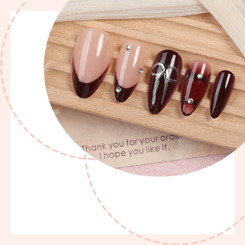 Creative nail art set with elaborate two-tone effect and elegant embellishments Stornfield