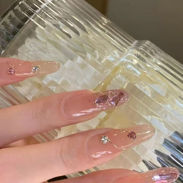 Artistic Nail Extensions with Glitter Accents Stornfield