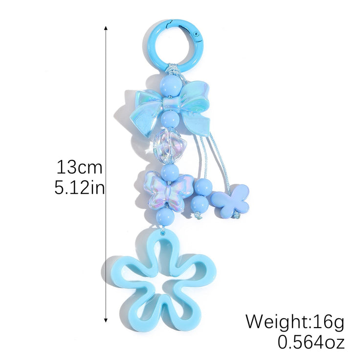 Playful keychain with flower and butterfly details Stornfield