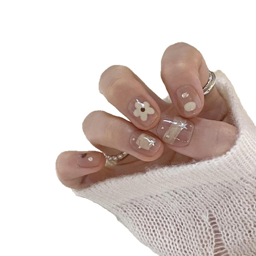 Artificial nails with elegant floral designs Stornfield