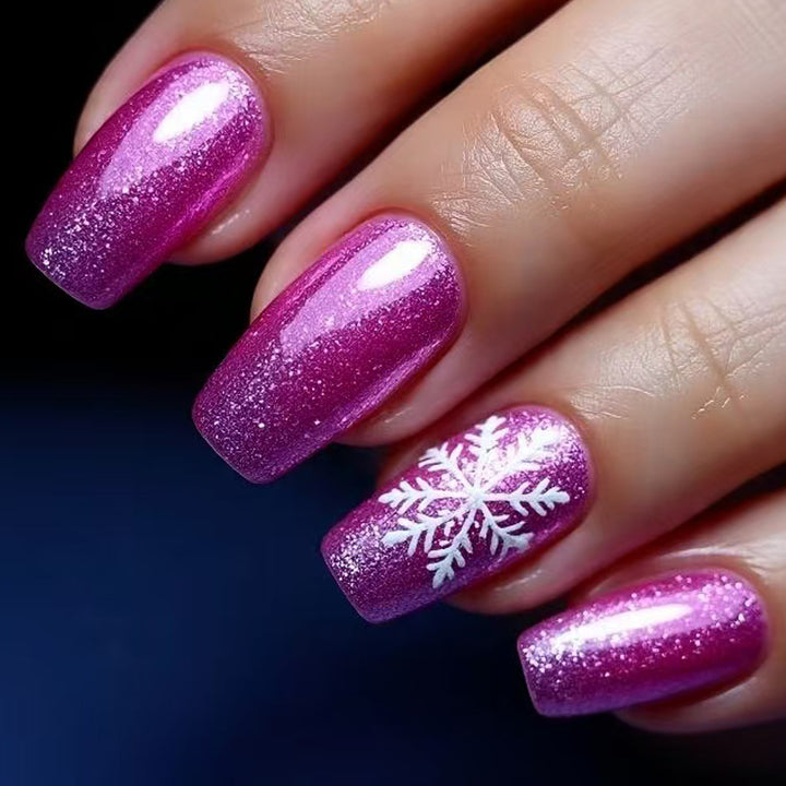 Glittering artificial nails with wintry snowflake design Stornfield