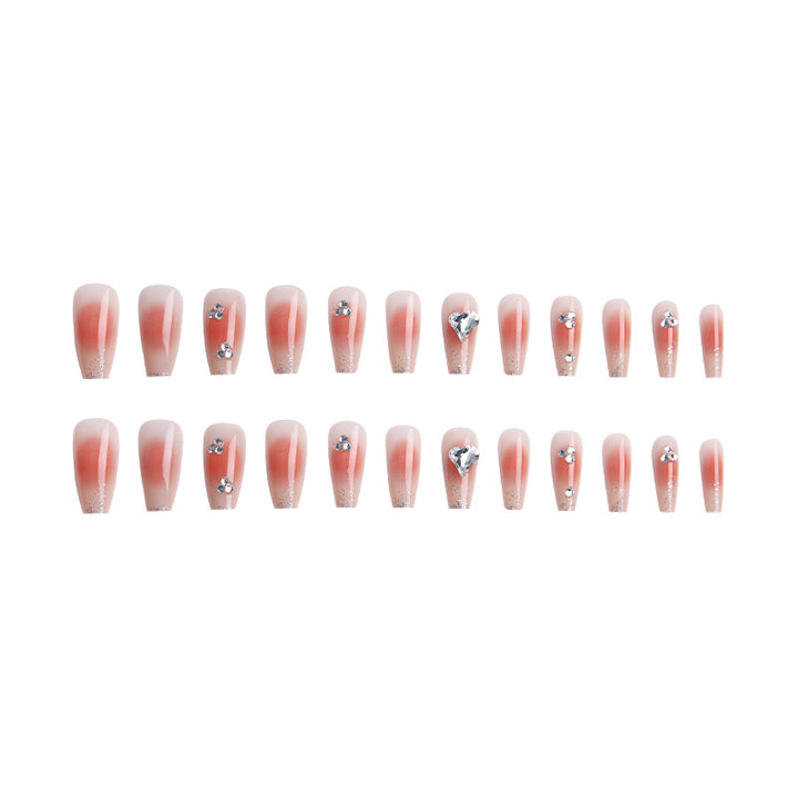 Acrylic nail set with elegant heart and rhinestone decorations Stornfield