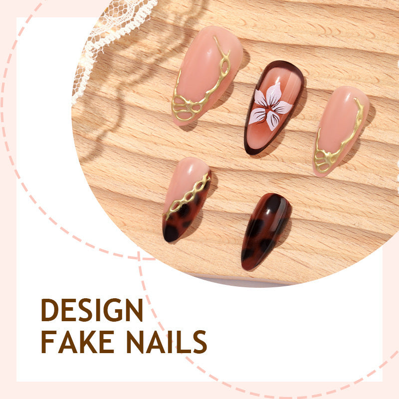 Artificial nail set with elegant floral decor and glitter elements Stornfield