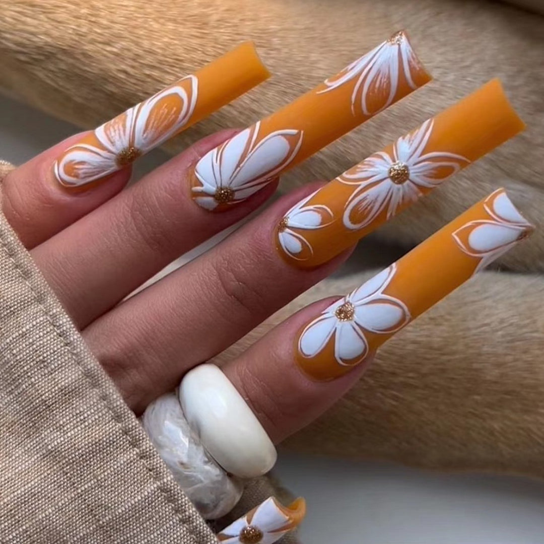 Stylish artificial nails with floral accents Stornfield