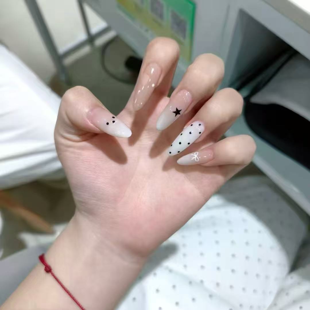 Artistic Press-On Nail Set with Star and Dot Patterns Stornfield