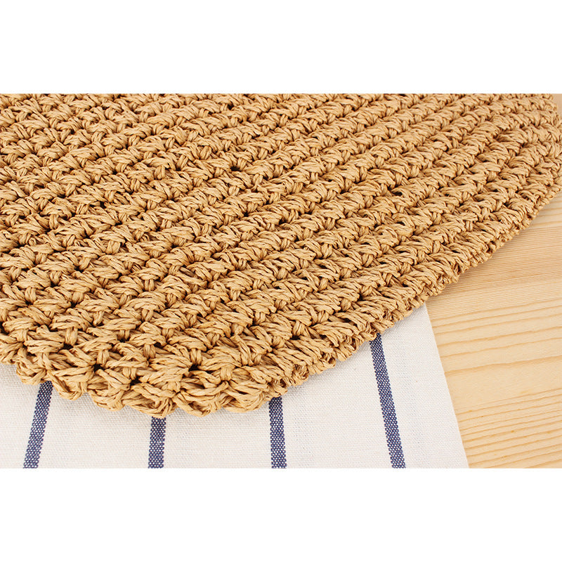 Beach bag made of natural raffia with playful design and elegant bow decoration Stornfield