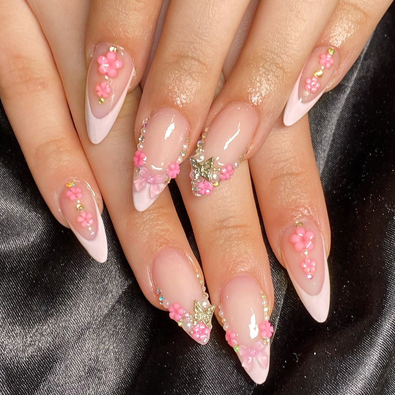 Creative nail art set with playful flower and glitter accents Stornfield