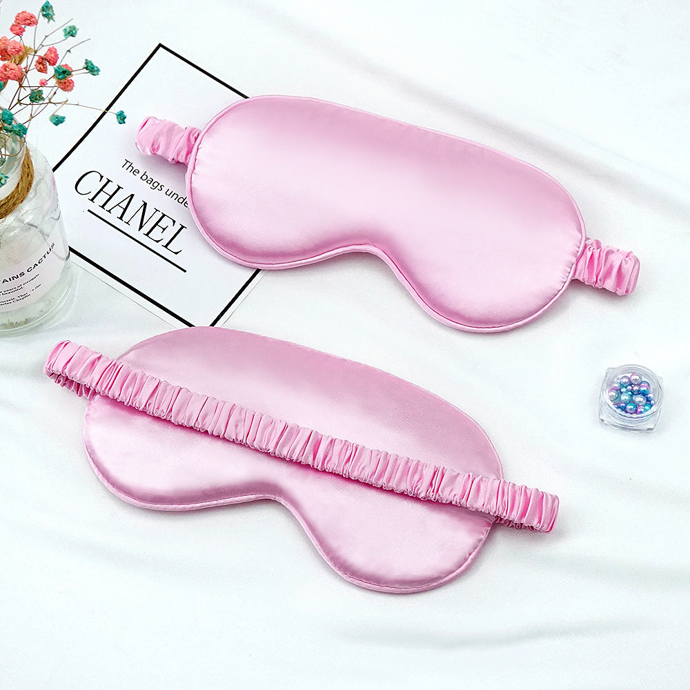 Women's breathable satin eye mask with ergonomic curvature, soft padding and gathered anti-slip band Stornfield