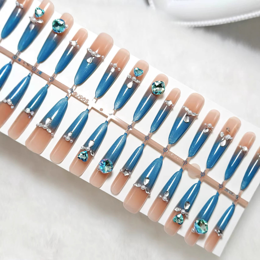 Glamorous artificial nails with sparkling rhinestone elements Stornfield