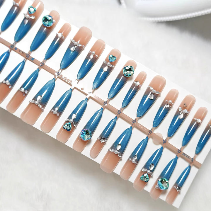 Glamorous artificial nails with sparkling rhinestone elements Stornfield