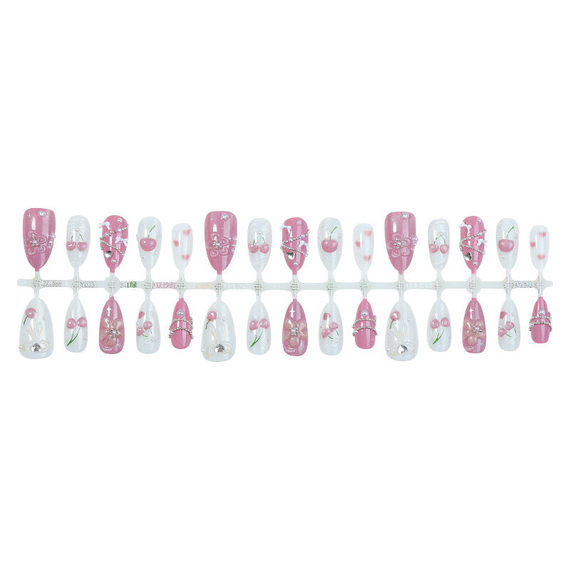 Artificial nail set with decorative floral motifs and glamorous accents Stornfield