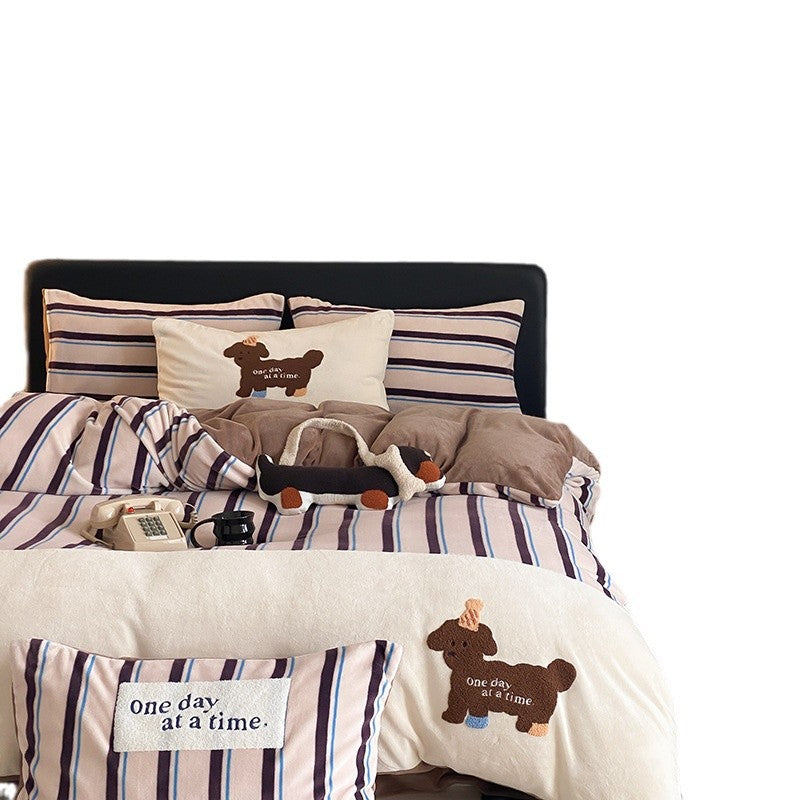 Cotton bedding set with striped look, embroidery motif and plush application