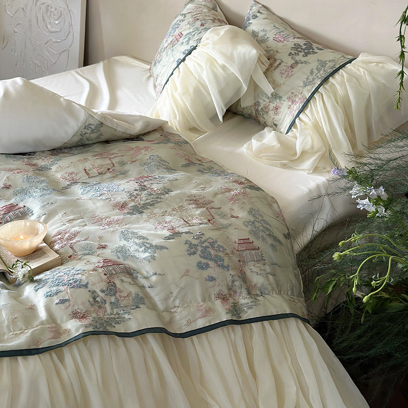 Satin bedding set with ruffled bed skirt and vintage toile print