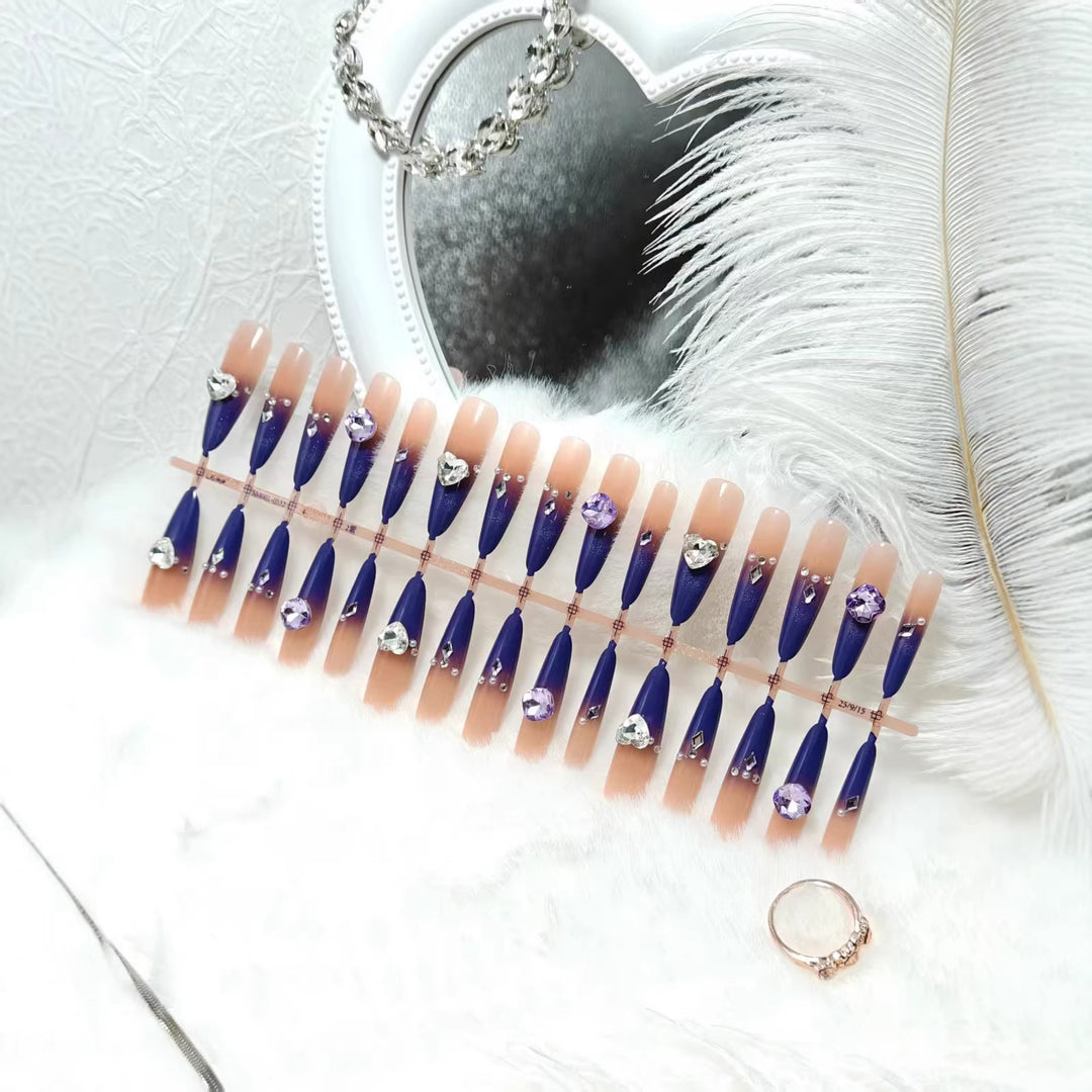Artificial nails with elegant glitter design and 3D rhinestone accents Stornfield