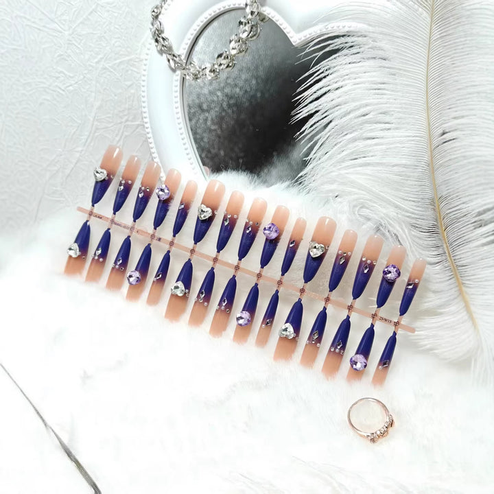 Artificial nails with elegant glitter design and 3D rhinestone accents Stornfield