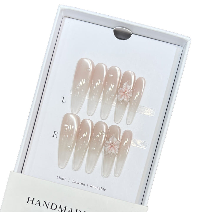 Elegant Stiletto Nail Extensions with Floral Accents Stornfield