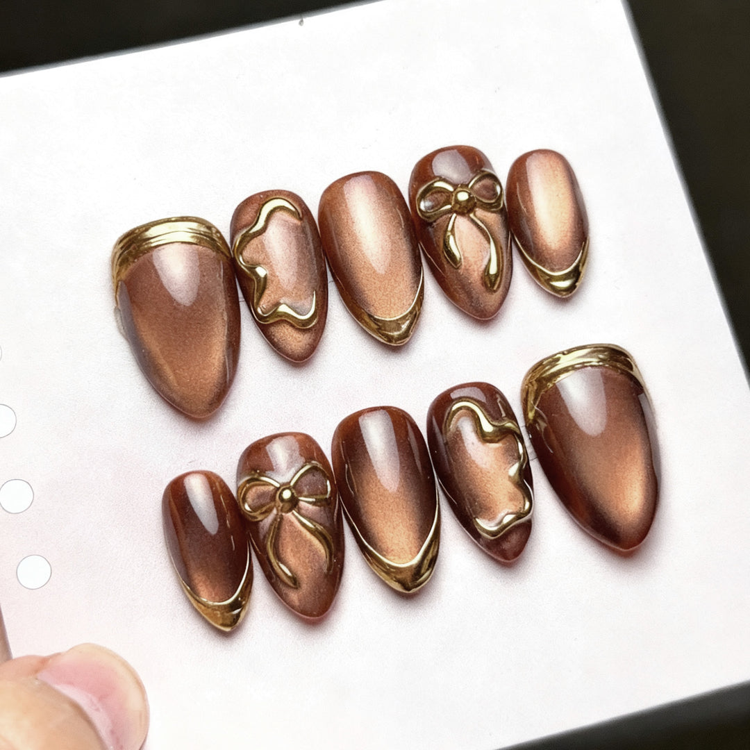 Elegant artificial nails with gold accents Stornfield
