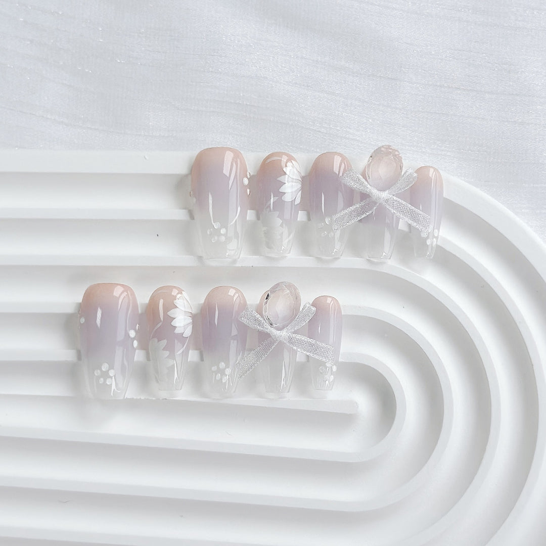 Artistic Press-On Nail Art Set with Heart and Celestial Designs