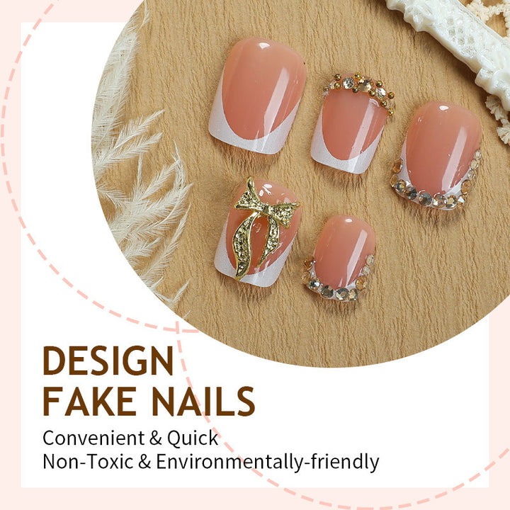 Artificial nail set with elegant glitter and flower decorations Stornfield