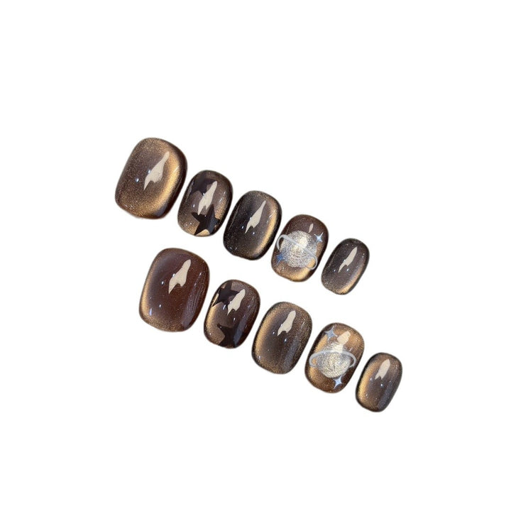 Artificial nail set with star and planet design Stornfield