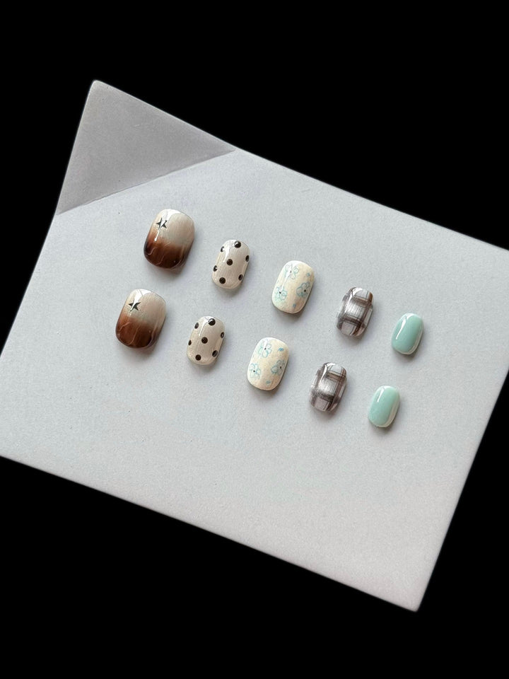 Artistic Press-On Nail Art Set with Elegant Floral and Polka Dot Designs