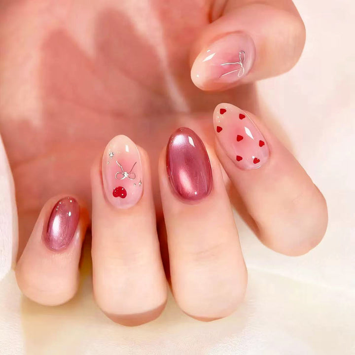 Nail art set with romantic hearts and elegant bows Stornfield