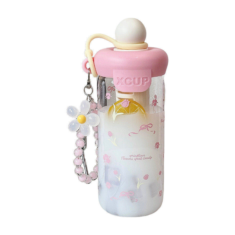Women's bottle with integrated fruit infuser and Stornfield keychain