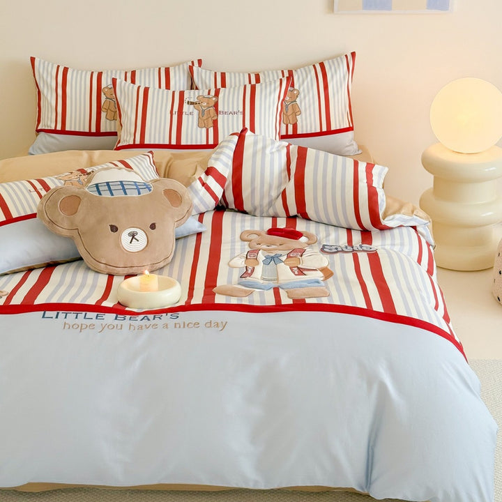 Children's bedding set with embroidered teddy bear design and fine stripes