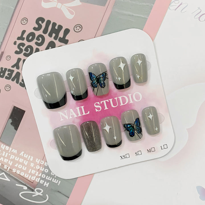 Artistic nail tips with butterfly designs Stornfield