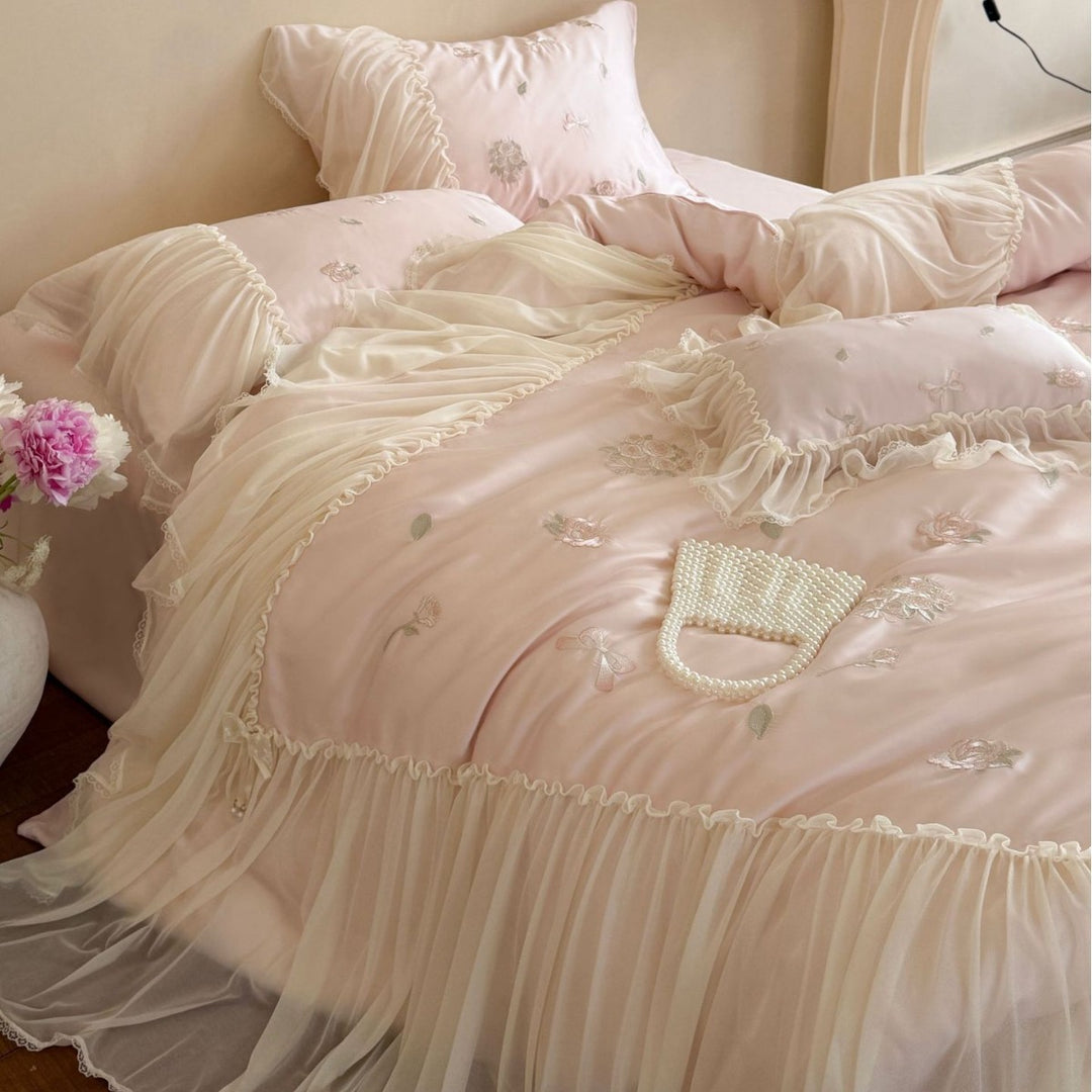Romantic embroidered bedding set with ruffled frill and tulle overlay