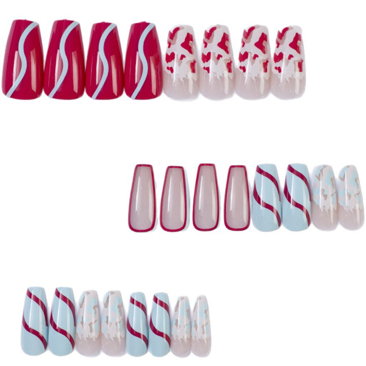 Artificial nails with modern wave pattern and heart accents Stornfield