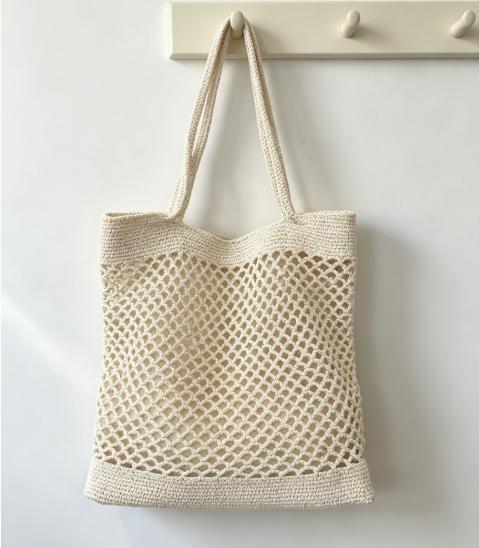 Hand-knotted shopping bag in modern net design Stornfield