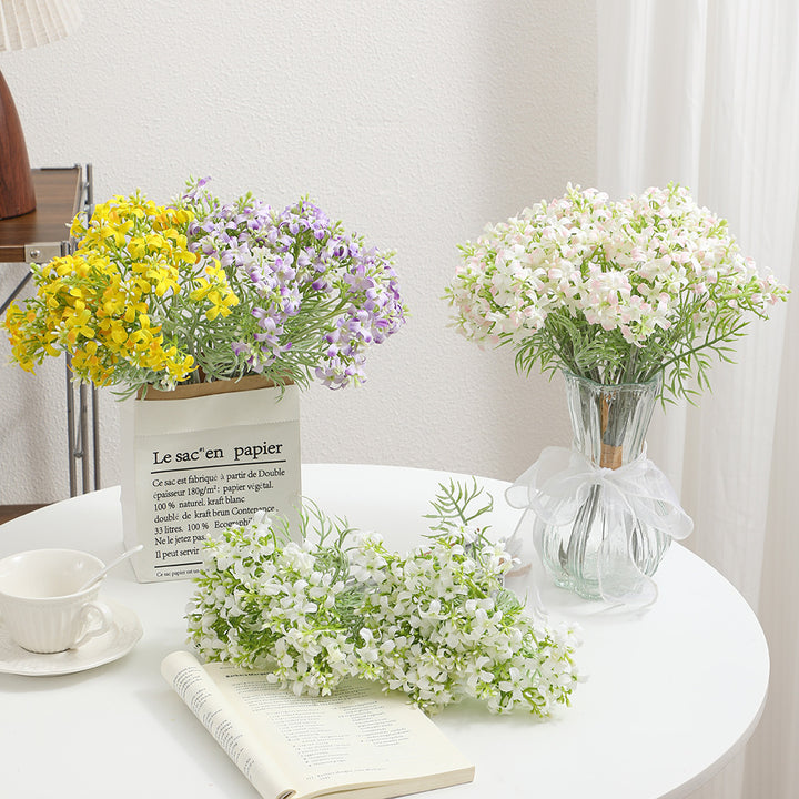 Decorative artificial flower arrangement