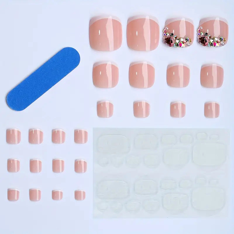 Artificial nail set with elegant French tips and glamorous crystal embellishments Stornfield
