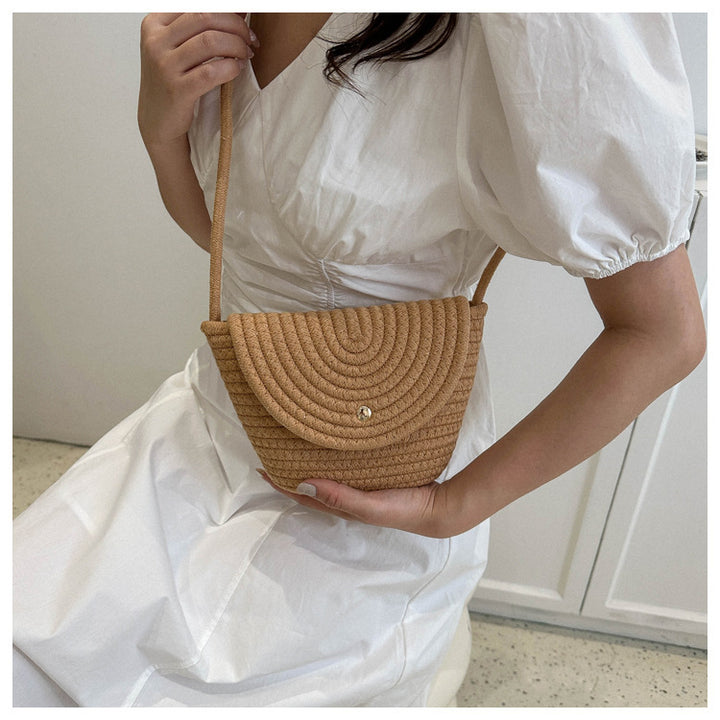 Hand-knotted mini bag with curved design Stornfield