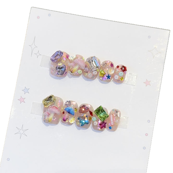 Artificial nails with sparkling crystal accents Stornfield