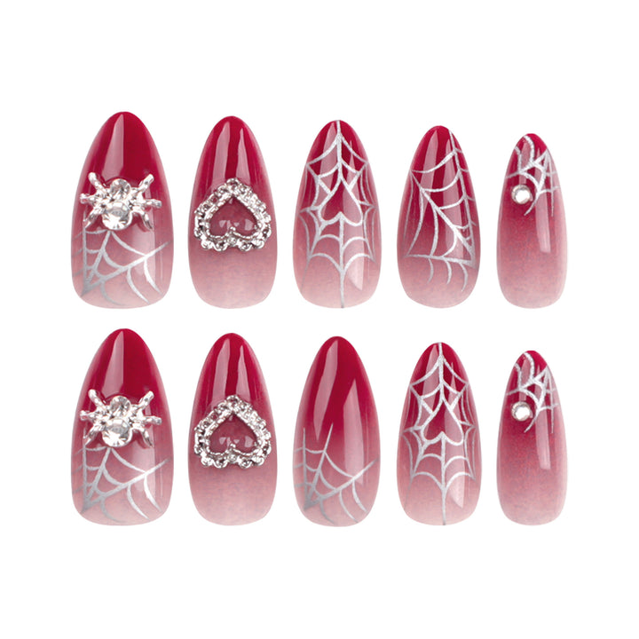 Nail art set with filigree spider web design and glitter accents Stornfield