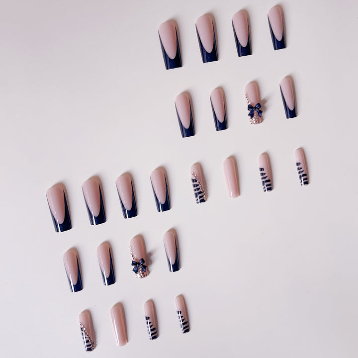 Artificial nail set with elegant tips and glamorous accents Stornfield