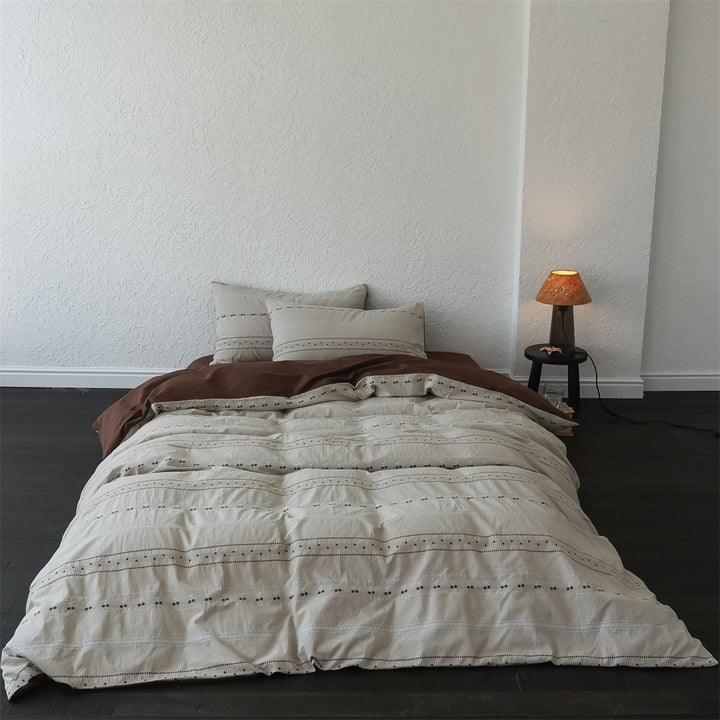 Reversible duvet cover set made of organic cotton in linen look with decorative eyelet embroidery