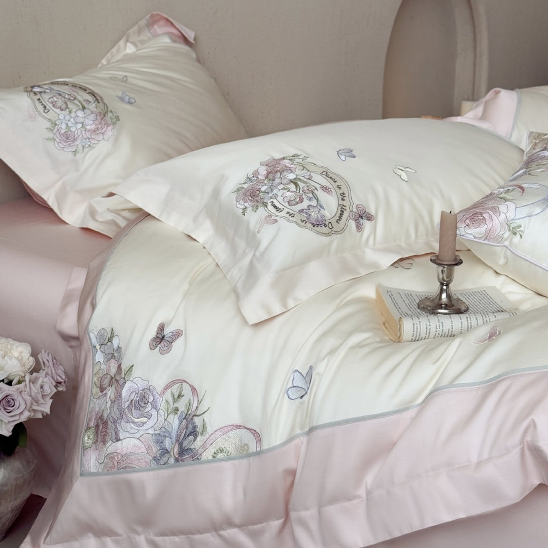 Luxurious floral embroidered cotton satin bedding set with ruffle and decorative pillow Stornfield