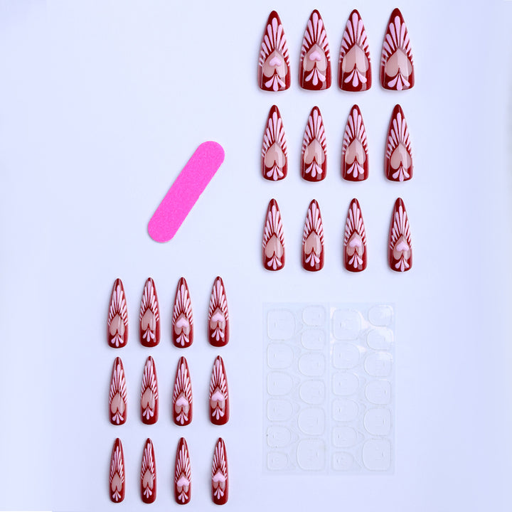 Artificial nails with playful heart design and elegant accents Stornfield