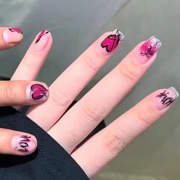 Creative Nail Art with Heart and Butterfly Design Stornfield