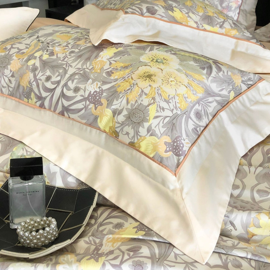 Luxurious cotton satin bedding set with floral print, ruffled bed skirt, and pillowcases