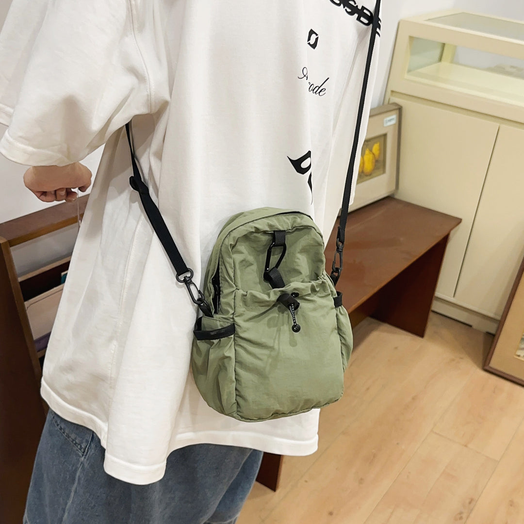 Practical crossbody backpack with multifunctional compartments Stornfield