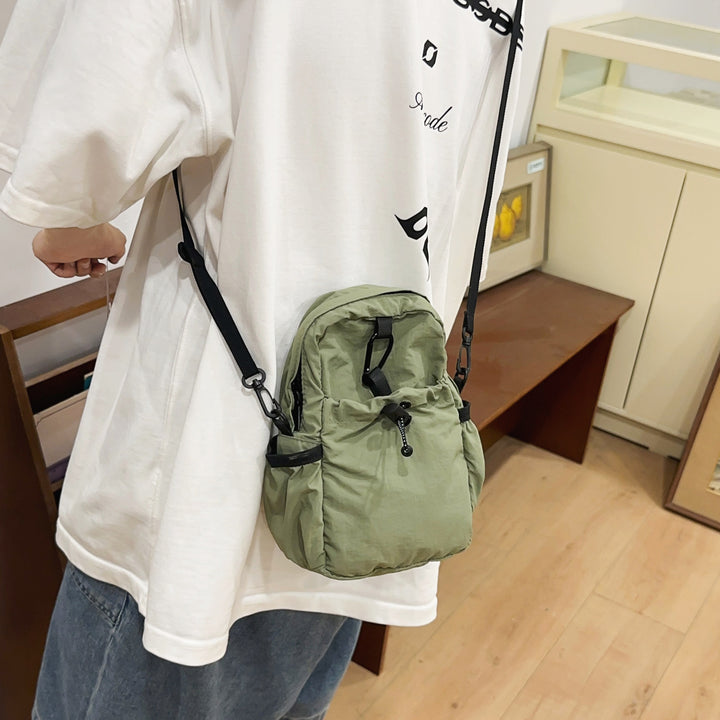 Practical crossbody backpack with multifunctional compartments Stornfield